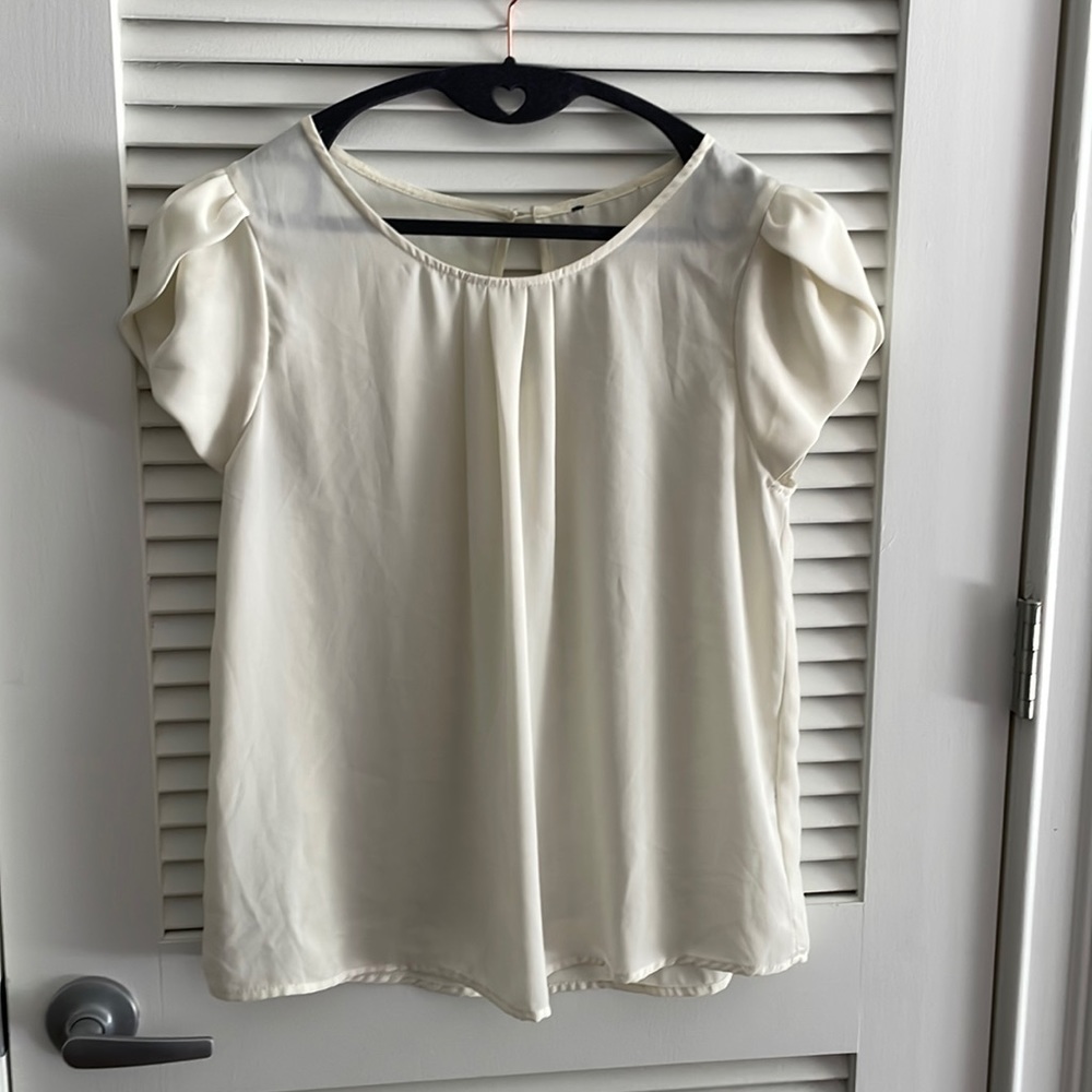 Delicate crepe flutter sleeve flowy top